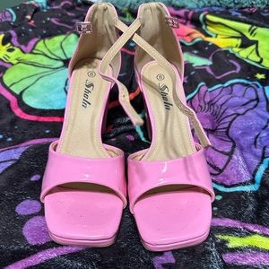 Pink high heels, size 8 women’s